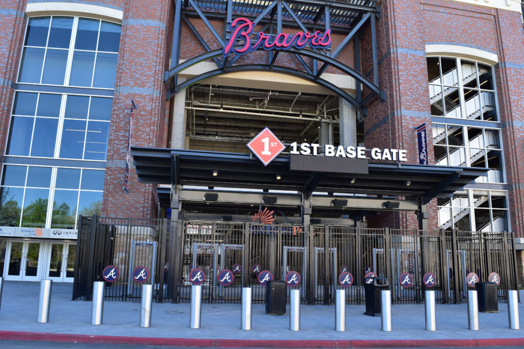 Row of stainless steel security bollards installed at the 1st Base Gate of Row of stainless steel security bollards installed at the 1st Base Gate of Truist Park where the Atlanta Braves play.
